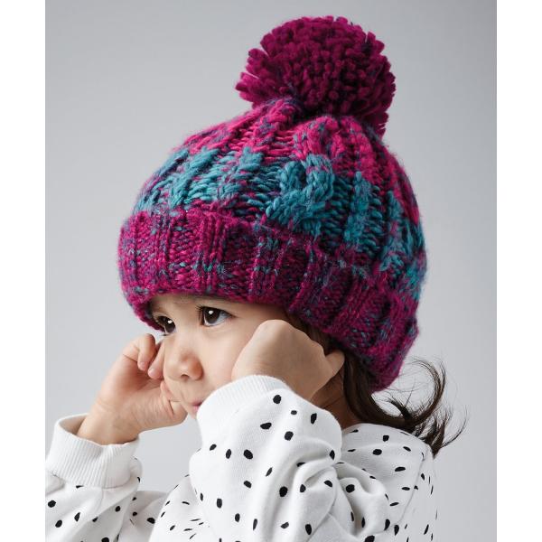 Junior corkscrew pom pom beanie